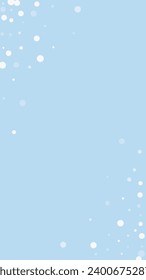 Magic falling snow christmas background. Subtle flying snow flakes and stars on light blue winter backdrop. Magic falling snow holiday scenery.   Vertical vector illustration.