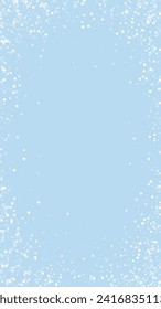 Magic falling snow christmas background. Subtle flying snow flakes and stars on light blue winter backdrop. Magic falling snow holiday scenery.   Vertical vector illustration.