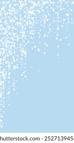 Magic falling snow christmas background. Subtle flying snow flakes and stars on light blue winter backdrop. Magic falling snow holiday scenery.   Vertical vector illustration.