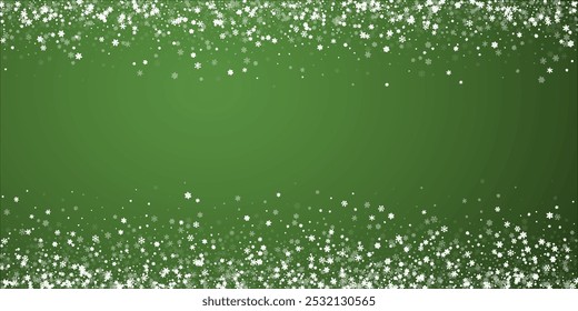 Magic falling snow christmas background. Subtle flying snow flakes and stars on christmas green background. Magic falling snow holiday scenery.   Wide vector illustration.