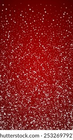 Magic falling snow christmas background. Subtle flying snow flakes and stars on christmas red background. Magic falling snow holiday scenery.   Vertical vector illustration.