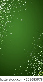 Magic falling snow christmas background. Subtle flying snow flakes and stars on christmas green background. Magic falling snow holiday scenery.   Vertical vector illustration.