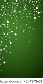 Magic falling snow christmas background. Subtle flying snow flakes and stars on christmas green background. Magic falling snow holiday scenery.   Vertical vector illustration.