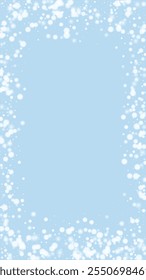 Magic falling snow christmas background. Subtle flying snow flakes and stars on light blue winter backdrop. Magic falling snow holiday scenery.   Vertical vector illustration.