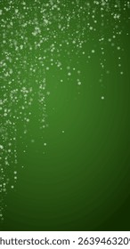 Magic falling snow christmas background. Subtle flying snow flakes and stars on christmas green background. Magic falling snow holiday scenery. Vertical vector illustration.