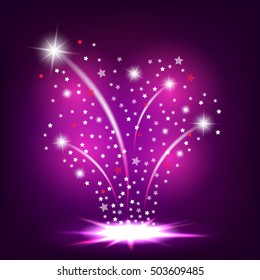 Magic fireworks with light effect on a purple background. Fountain of the glow and shine.