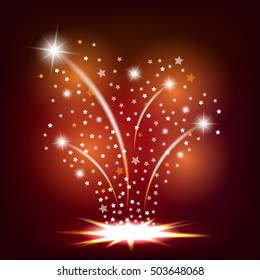 Magic fireworks with light effect on a red background. Fountain of the glow and shine.
