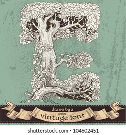 Magic grunge forest hand drawn by a vintage font - E