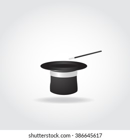 Magic hat with with magic wand on white background.
