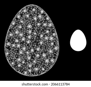 Magic mesh vector egg with glare effect. White mesh, glare spots on a black background with egg icon. Mesh and lightspot elements are placed on different layers.