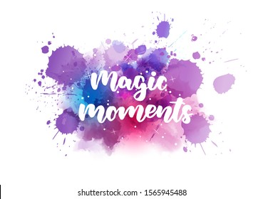 Magic moments - handwritten modern calligraphy lettering text on purple watercolor paint splash. Holiday illustration.