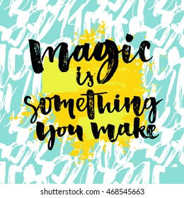 Magic is something you make. Inspiration phrase about life and love. Modern calligraphy text, brush and ink handwriting on artistic yellow and blue background