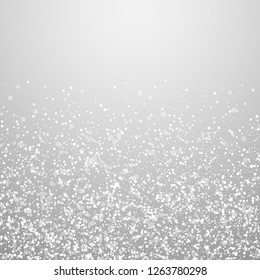 Magic stars Christmas background. Subtle flying snow flakes and stars on light grey background. Alluring winter silver snowflake overlay template. Energetic vector illustration.