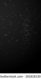 Magic stars Christmas background. Subtle flying snow flakes and stars on black background. Adorable winter silver snowflake overlay template. Nice vertical illustration.