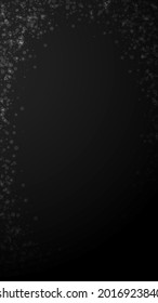 Magic stars Christmas background. Subtle flying snow flakes and stars on black background. Actual winter silver snowflake overlay template. Trending vertical illustration.