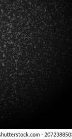 El fondo navideño de las estrellas mágicas. Sutiles copos de nieve volando y estrellas de fondo negro. Divertido modelo de superposición de copos de nieve de plata de invierno. Increíble ilustración vertical.