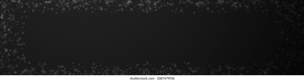 Magische Sterne Weihnachtshintergrund. Subtile fliegende Schneeflocken und Sterne auf schwarzem Hintergrund. Atemberaubende Winterschneeflocke. Stilvolle Panoramabildung.