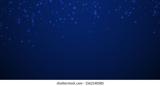 Magic stars random Christmas background. Subtle flying snow flakes and stars on dark blue night background. Awesome winter silver snowflake overlay template. Fetching vector illustration.