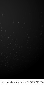 Magic stars random Christmas background. Subtle flying snow flakes and stars on black background. Amazing winter silver snowflake overlay template. Popular vertical illustration.