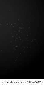 Magic stars random Christmas background. Subtle flying snow flakes and stars on black background. Alive winter silver snowflake overlay template. Exotic vertical illustration.