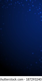 Magic stars random Christmas background. Subtle flying snow flakes and stars on dark blue background. Admirable winter silver snowflake overlay template. Fancy vertical illustration.