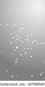 Magic stars random Christmas background. Subtle flying snow flakes and stars on grey background. Alive winter silver snowflake overlay template. Extra vertical illustration.