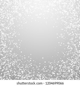 Magic stars sparse Christmas background. Subtle flying snow flakes and stars on light grey background. Amusing winter silver snowflake overlay template. Classy vector illustration.