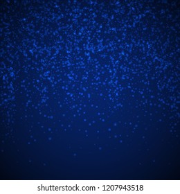 Magic stars sparse Christmas background. Subtle flying snow flakes and stars on dark blue night background. Bizarre winter silver snowflake overlay template. Captivating vector illustration.