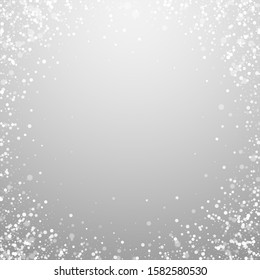 Magic stars sparse Christmas background. Subtle flying snow flakes and stars on light grey background. Amusing winter silver snowflake overlay template. Great vector illustration.