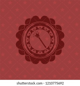 magic stick icon inside badge with red background