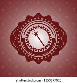 magic stick icon inside badge with red background
