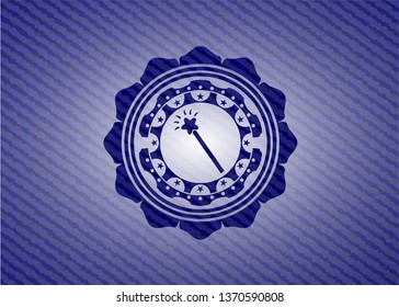 magic stick icon inside badge with jean texture