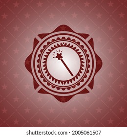 magic stick icon inside badge with red background. 