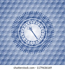 magic stick icon inside blue hexagon emblem.