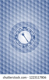 magic stick icon inside blue badge with geometric background.
