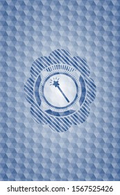 magic stick icon inside blue badge with geometric pattern background.