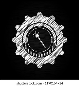 magic stick icon inside chalkboard emblem on black board