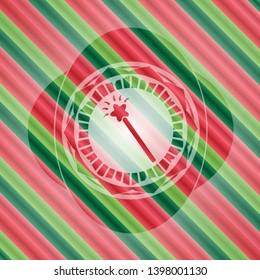 magic stick icon inside christmas badge.