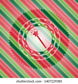 magic stick icon inside christmas colors badge.