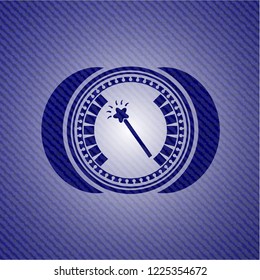 magic stick icon inside denim background