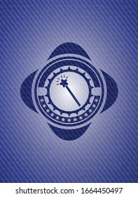 magic stick icon inside denim background