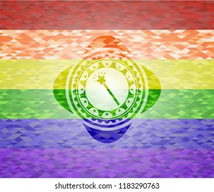 magic stick icon inside emblem on mosaic background with the colors of the LGBT flag