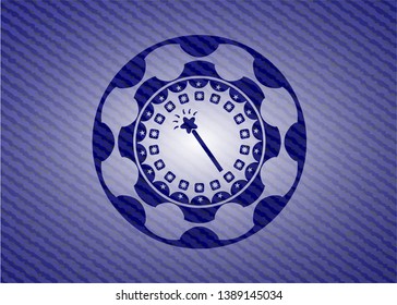magic stick icon inside emblem with denim texture