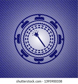 magic stick icon inside emblem with jean background