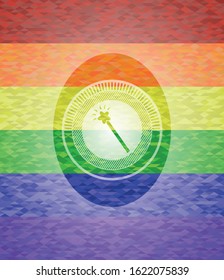 magic stick icon inside emblem on mosaic background with the colors of the LGBT flag