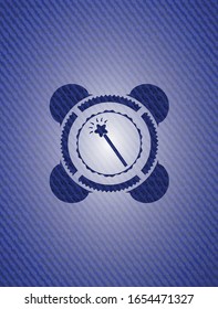 magic stick icon inside emblem with jean texture