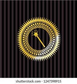 magic stick icon inside golden badge or emblem