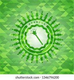 magic stick icon inside green emblem with mosaic background