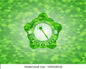 magic stick icon inside green mosaic emblem