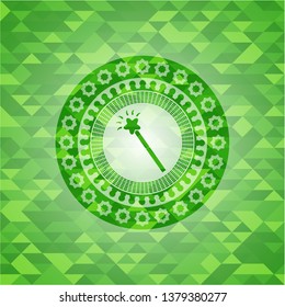 magic stick icon inside green emblem with triangle mosaic background